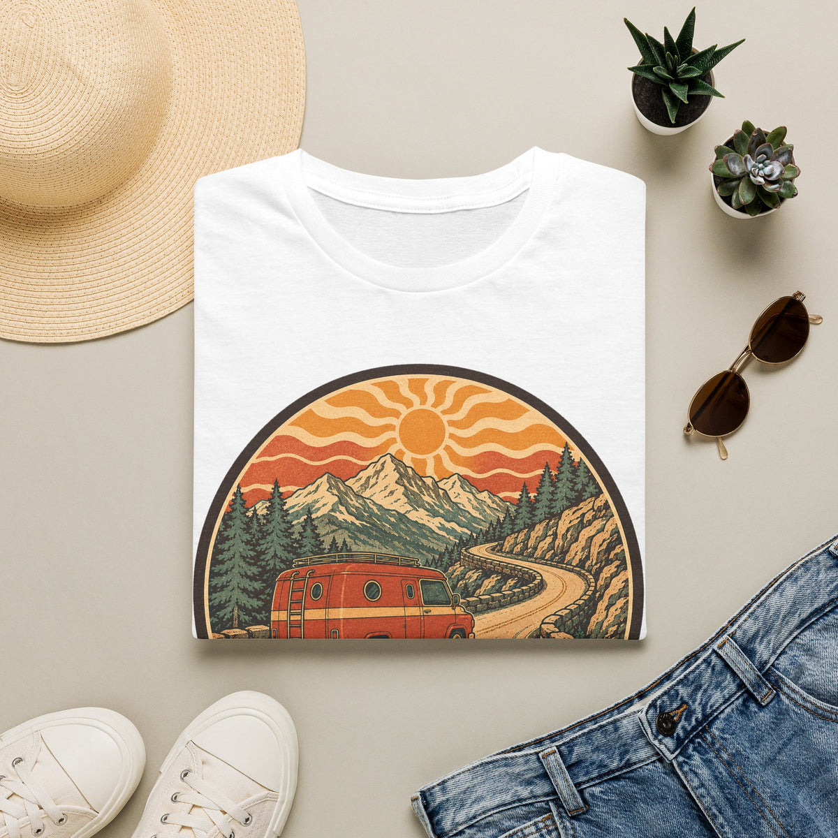 Unisex T-shirt in white with crew neck and mountain sunset van graphic on front.