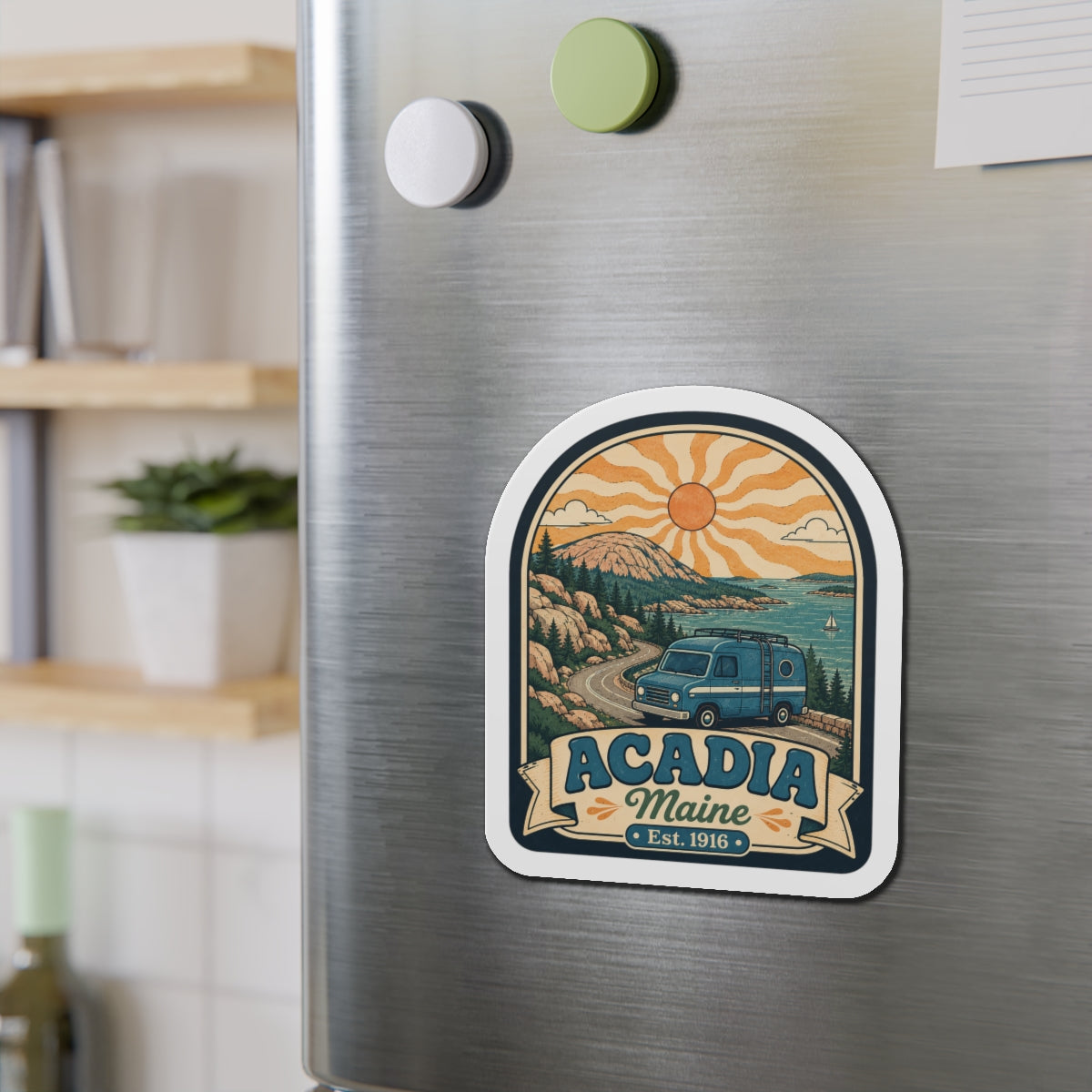 Die-cut Acadia Maine fridge magnet on stainless steel door with camper van landscape