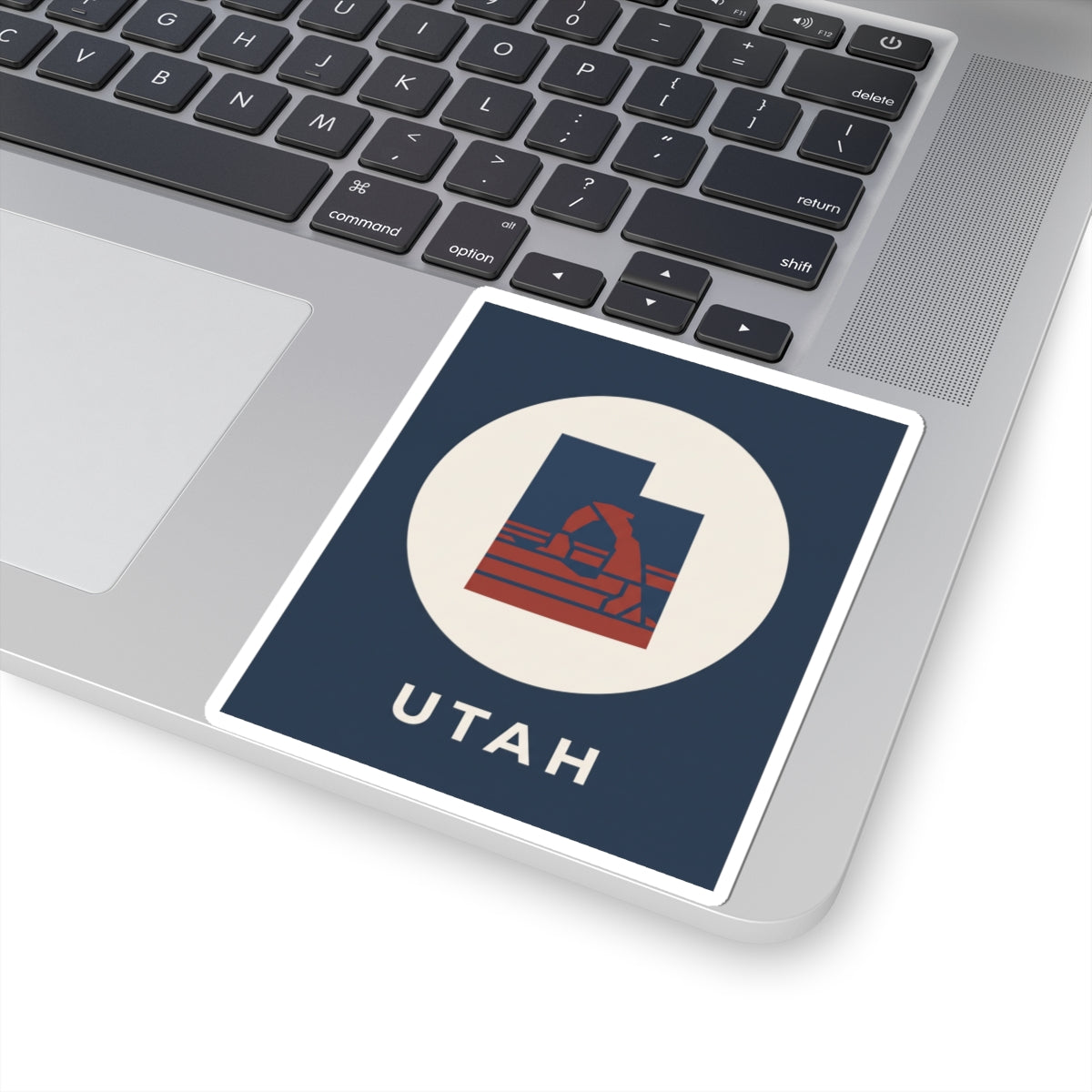 Navy Utah arch sticker with white circle, red arch design, and "UTAH" lettering