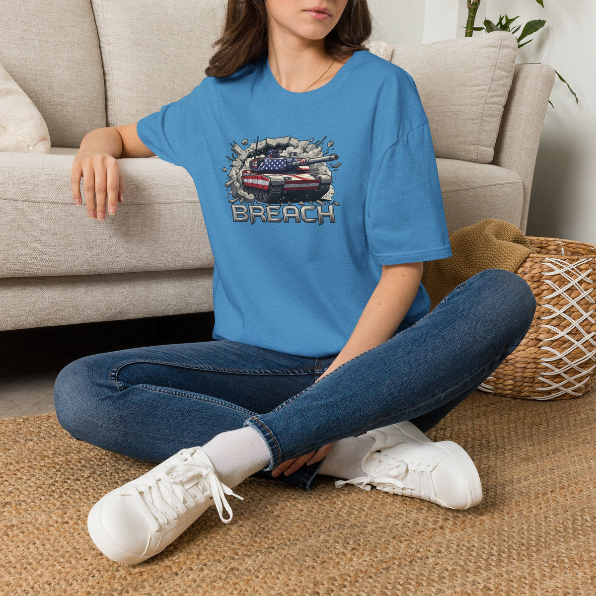Blue graphic crewneck T-shirt with 'BREACH' armored vehicle front print, worn