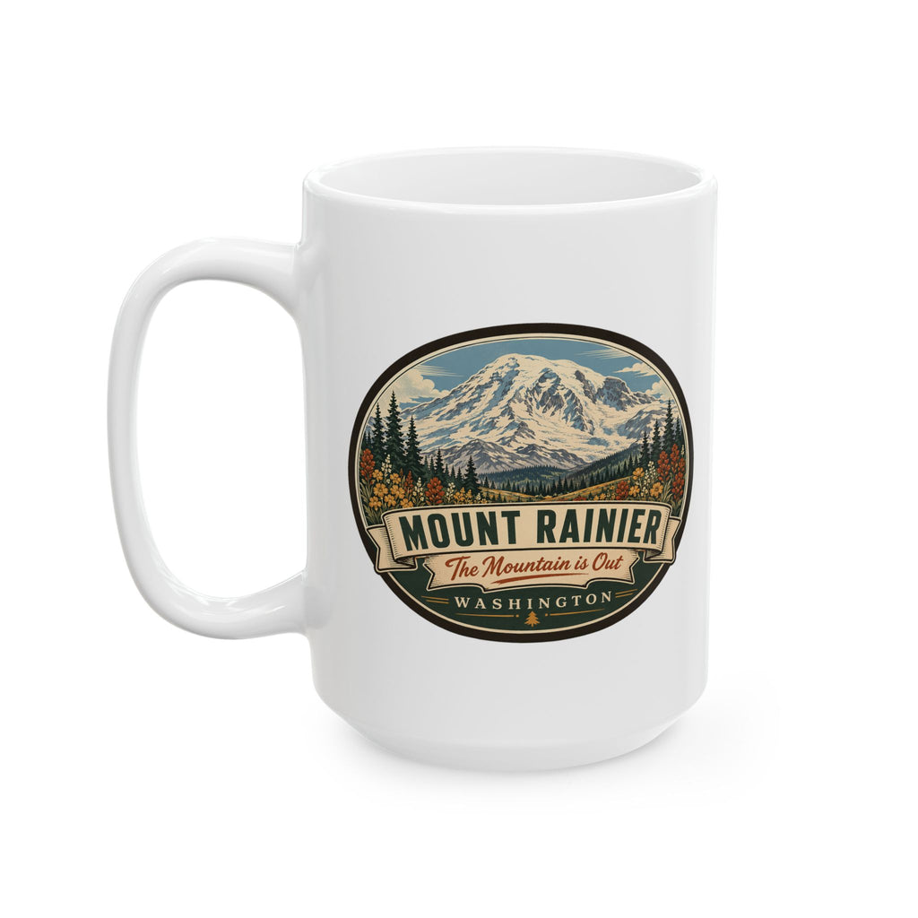 White ceramic mug with Mount Rainier landscape emblem graphic, handle and front view