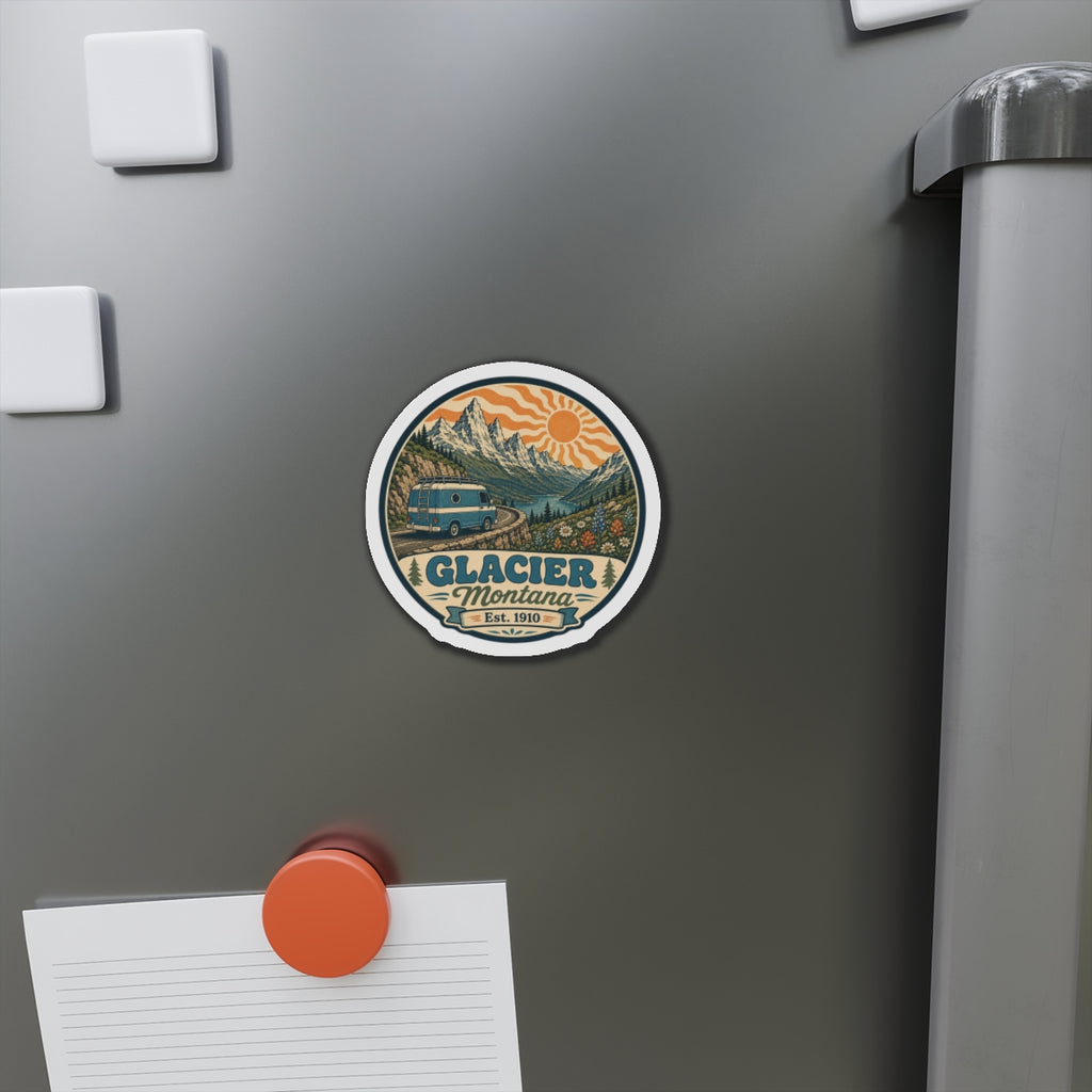 Die-cut fridge magnet on stainless steel refrigerator door with teal camper van and orange sun