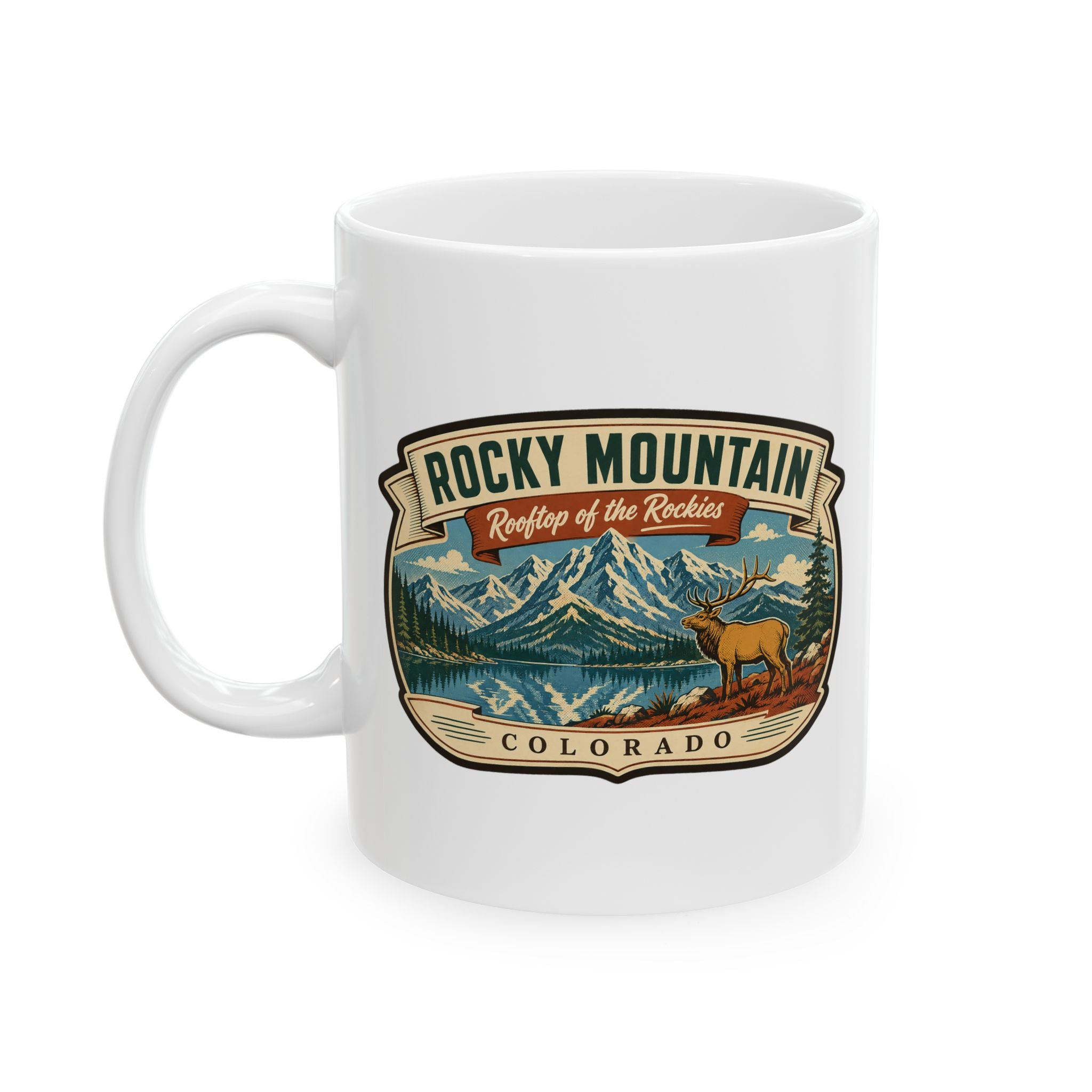 White ceramic coffee mug, Rocky Mountain Colorado badge with mountains and elk, front