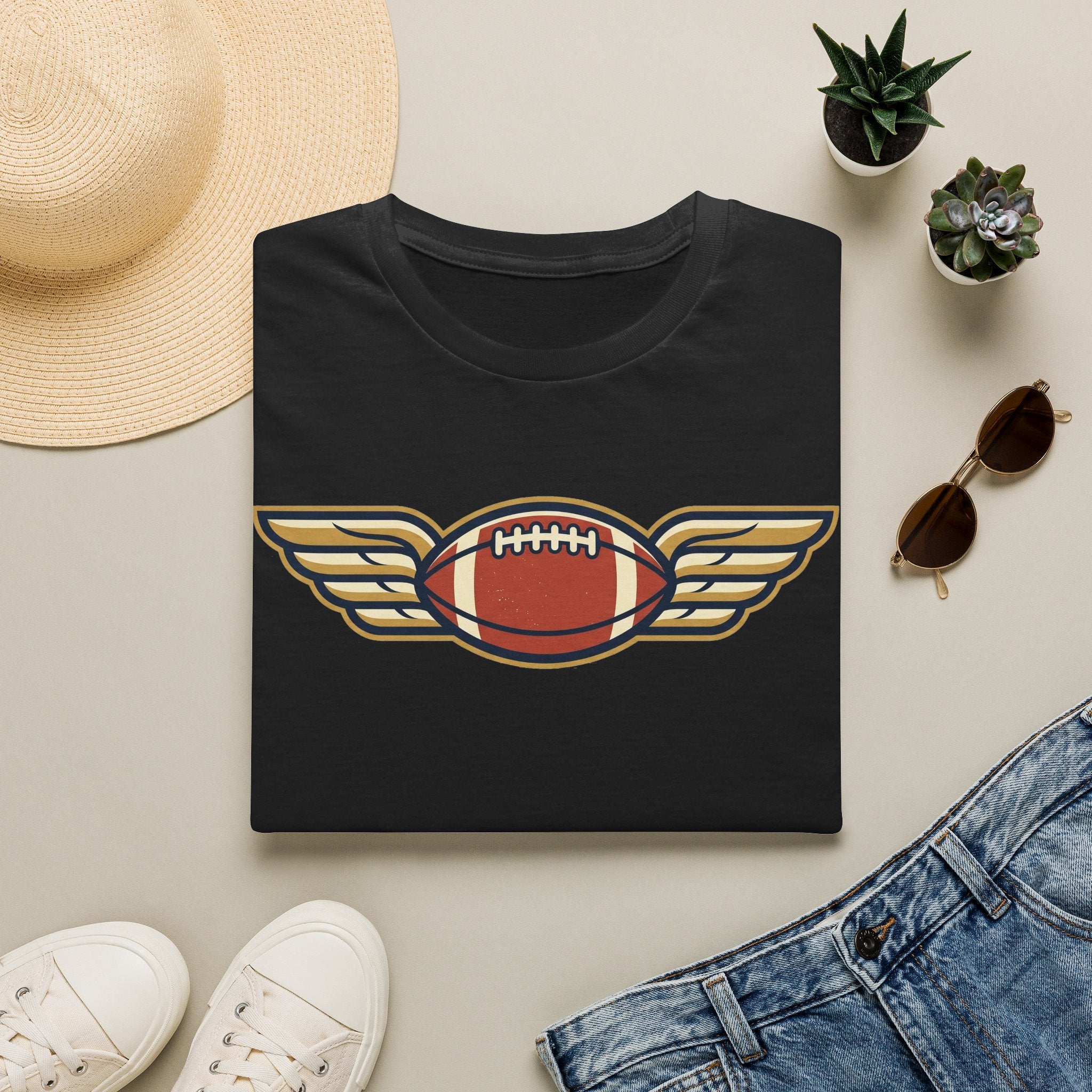 Black crewneck t-shirt with winged football graphic on the chest