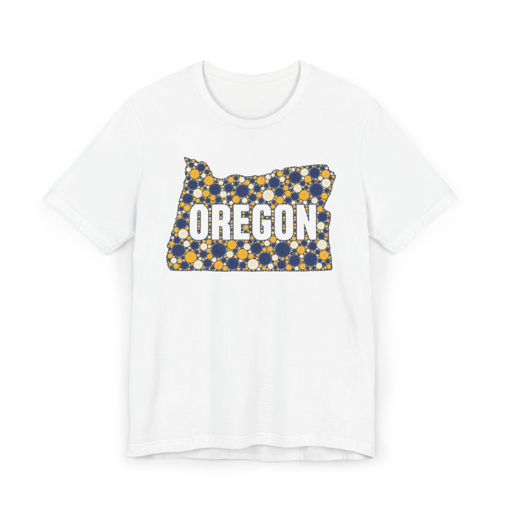 White Oregon map graphic t-shirt with blue and gold polka dot lettering