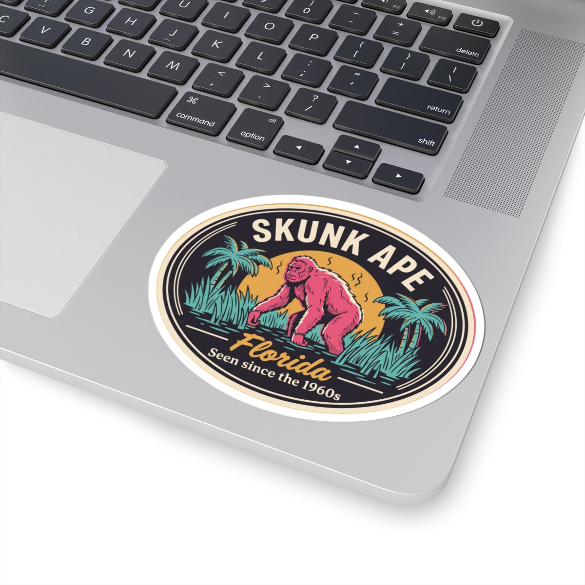 Skunk Ape Florida sticker, circular design with pink ape and “Florida” script plus “Seen since the 1960s”