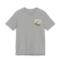 Men's light gray travel t-shirt with small vintage postage stamp-style tower graphic