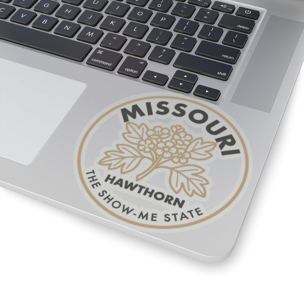 Transparent vinyl hawthorn state flower sticker on laptop lid, “THE SHOW-ME STATE” text