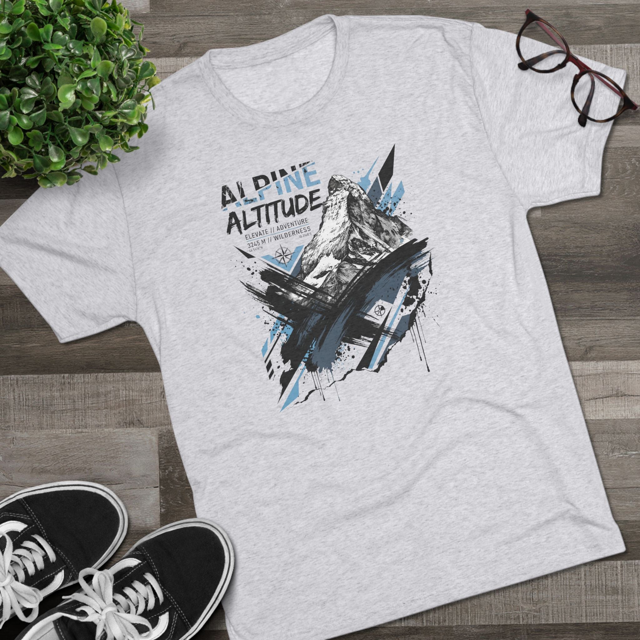 Graphic hiking T-shirt in light heather gray, mountain peak illustration with blue accents