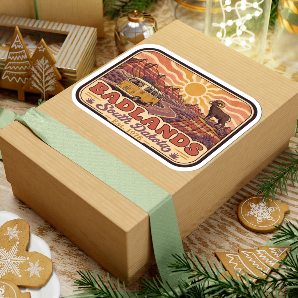 Kiss-cut sticker on gift box: vintage camper van, bighorn sheep, Badlands South Dakota text