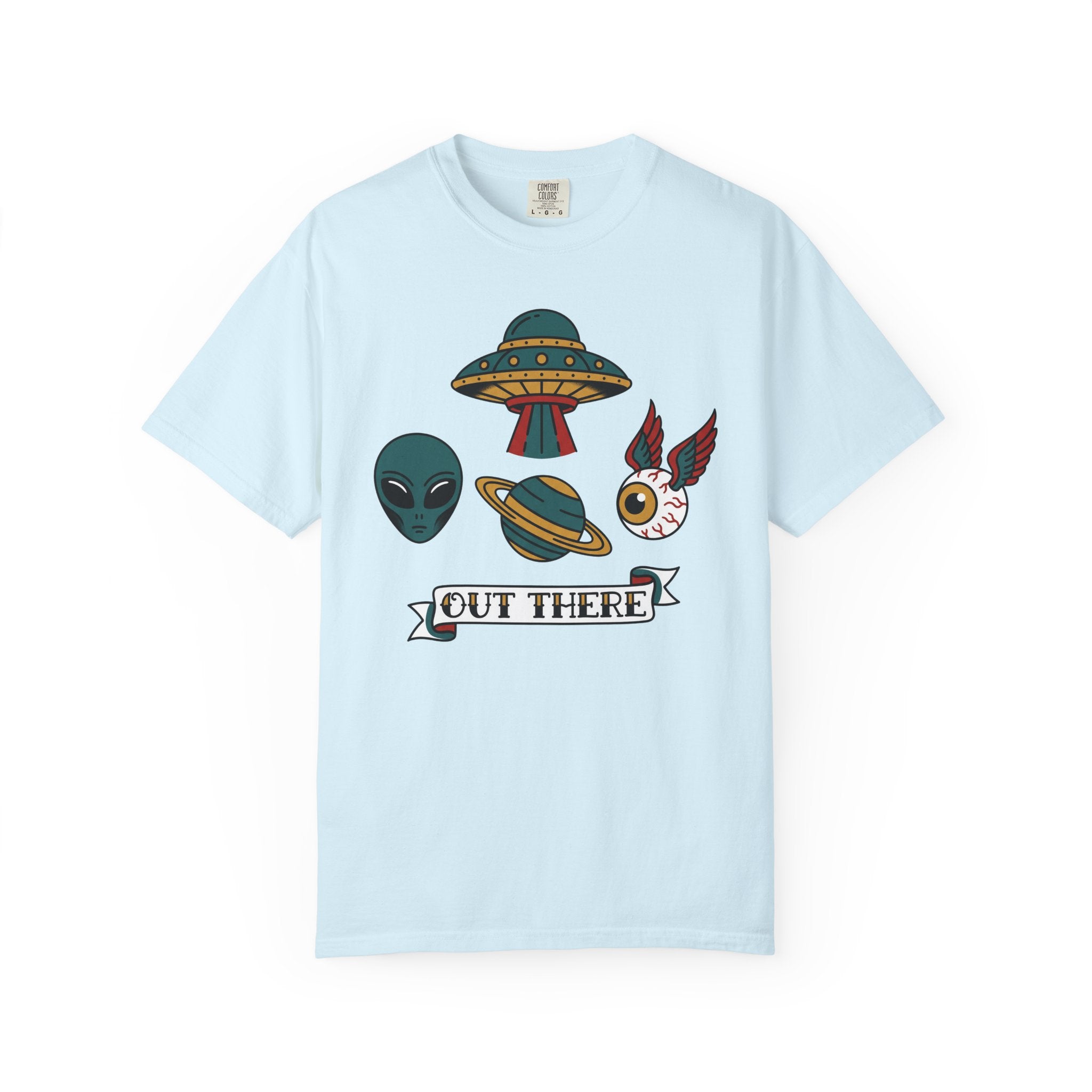 Light blue T-shirt with alien, UFO, and “OUT THERE” banner graphic at center