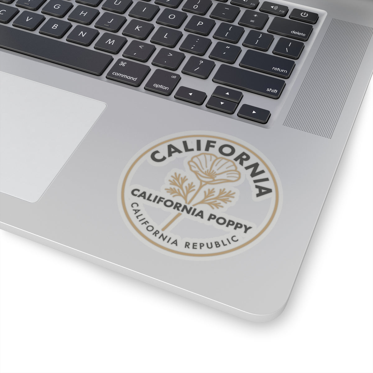 California poppy round sticker on laptop lid, beige poppy and California Republic text