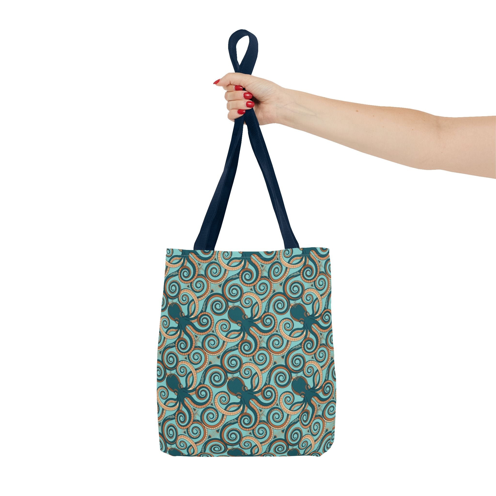 Teal tote bag with navy top handle loop and octopus swirl all-over print.