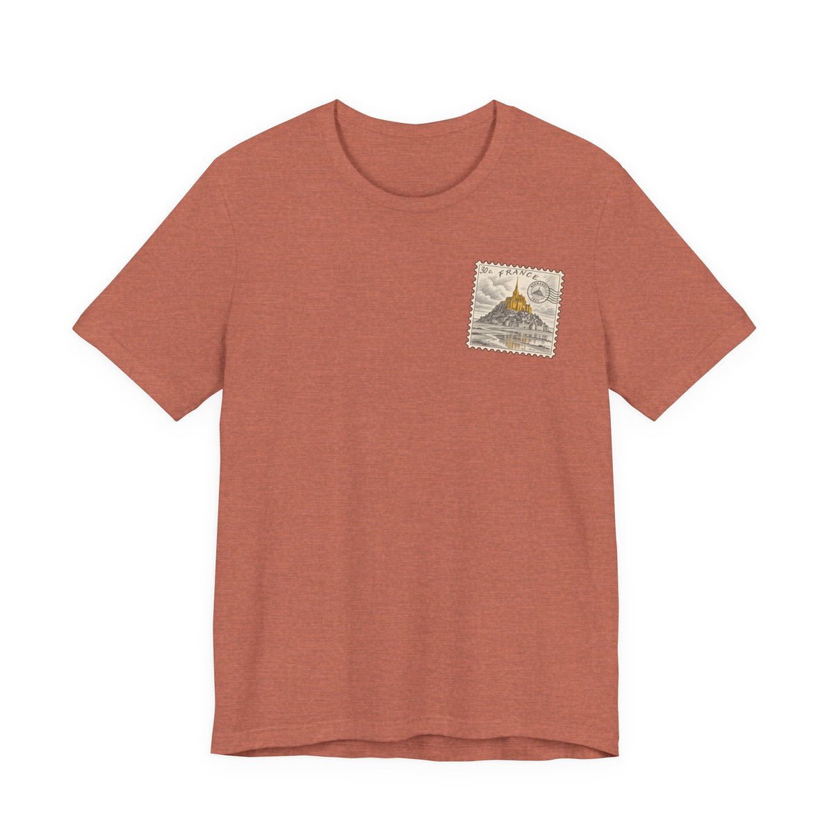 Rust brown T-shirt with small vintage postage stamp graphic on left chest.