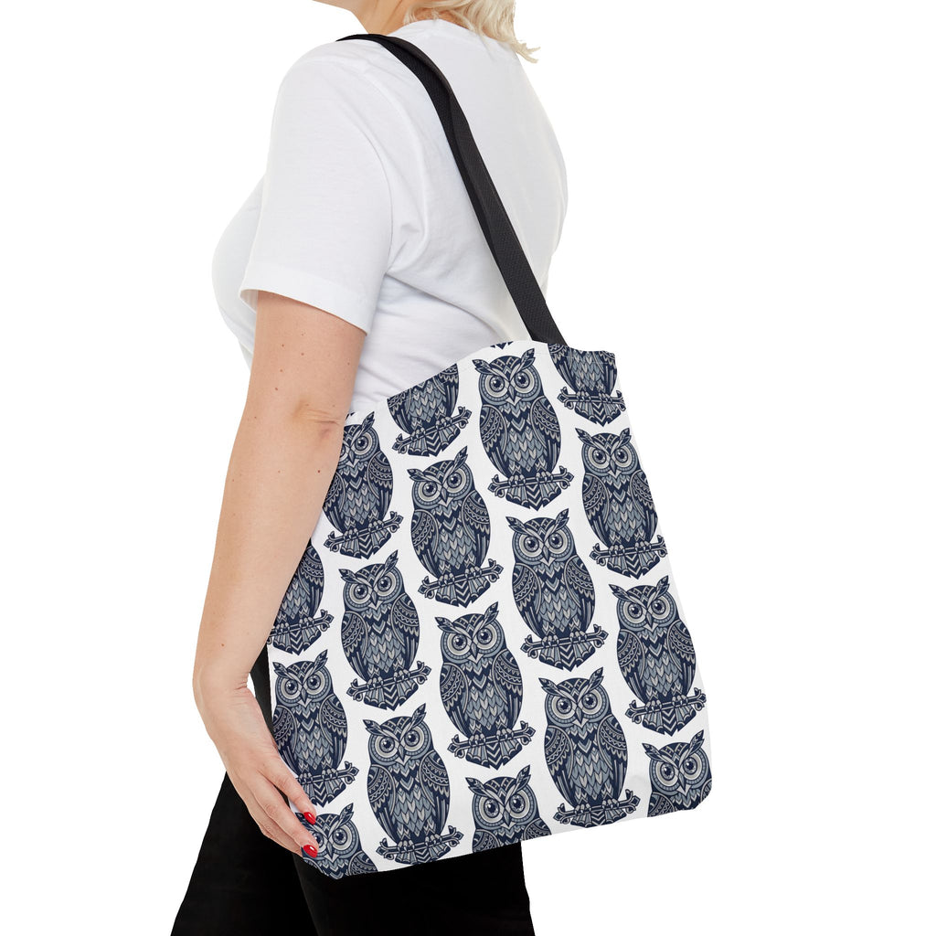Owl pattern tote bag with black handles; close view of repeating blue and white owl print.