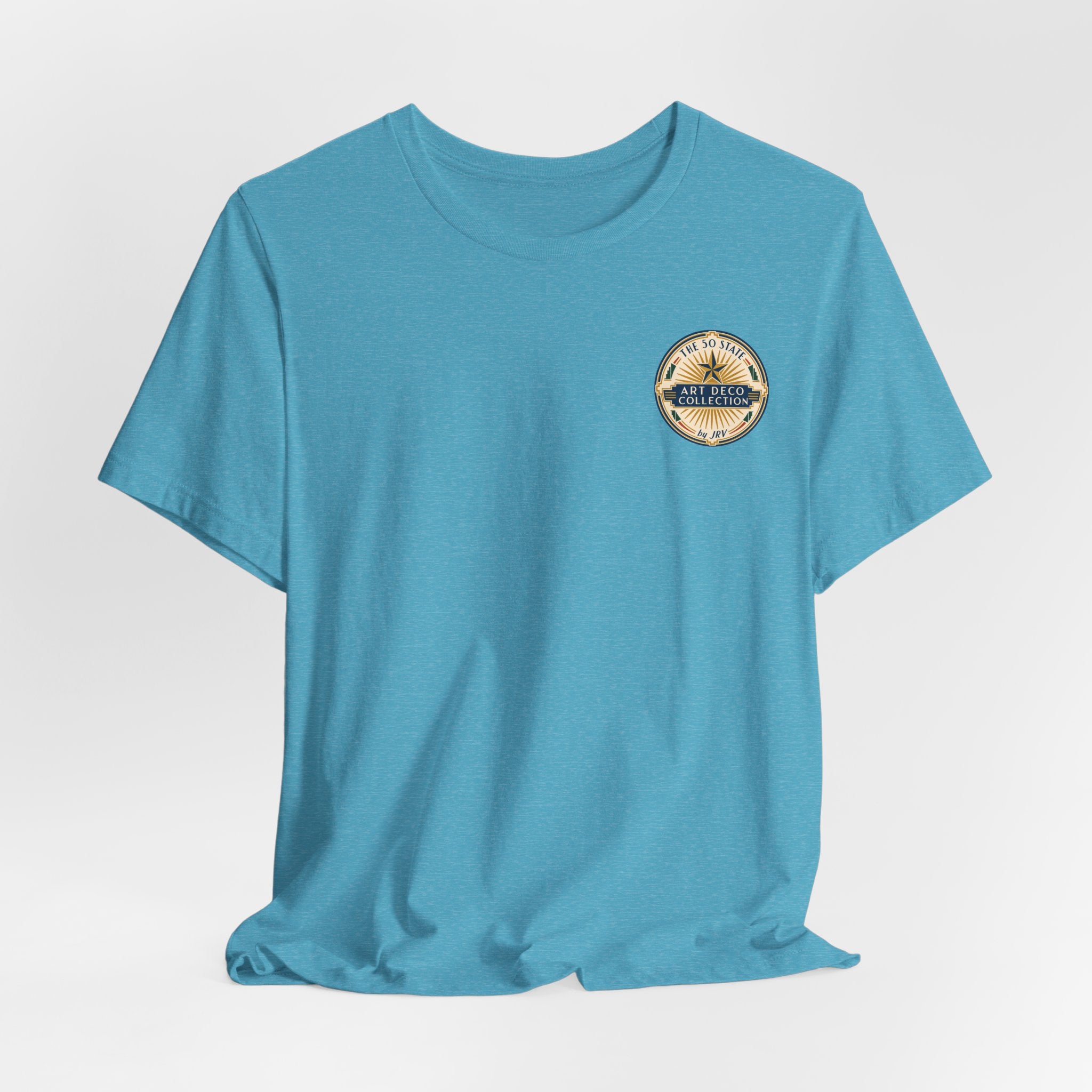 Teal crew-neck T-shirt with circular logo patch at upper right chest