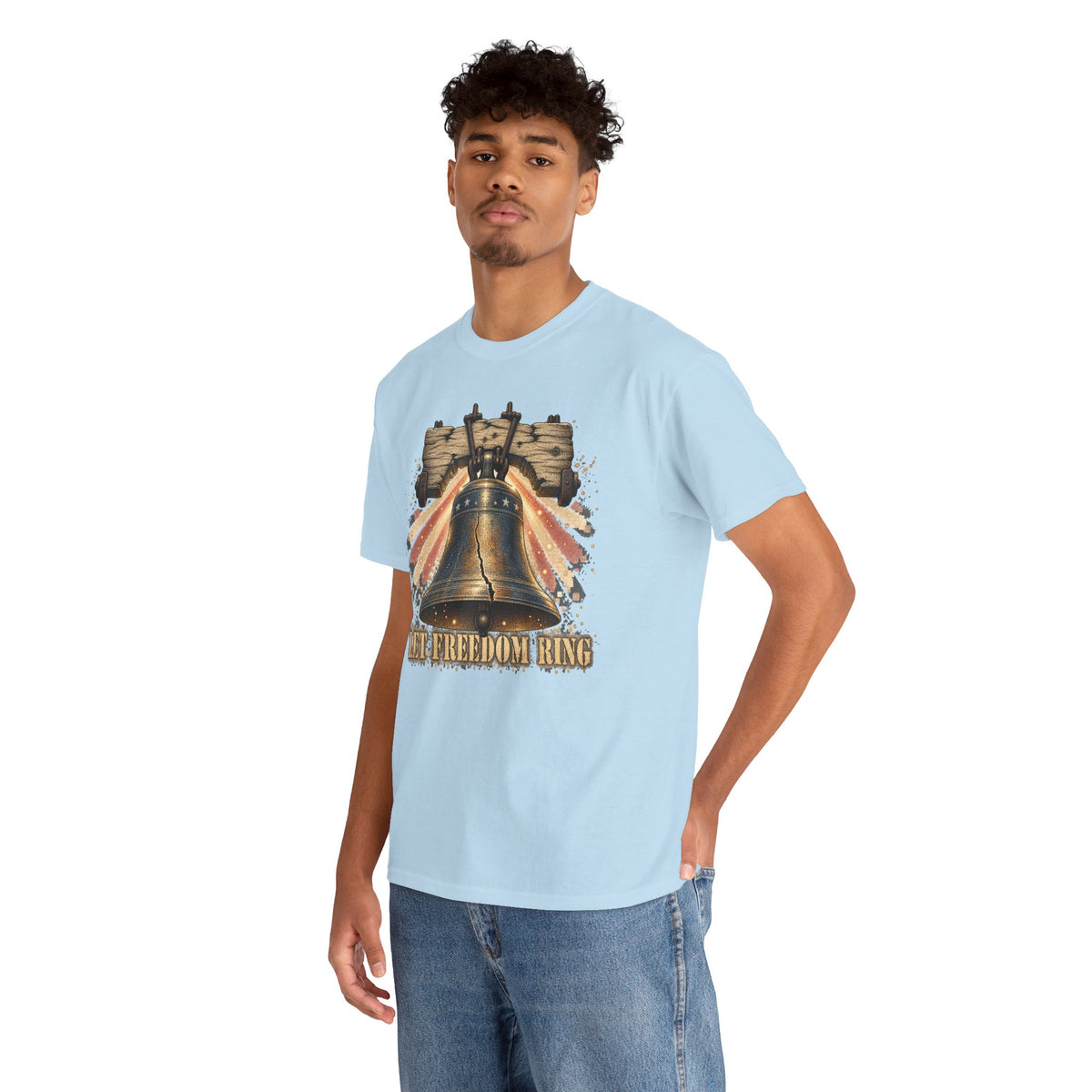 Light blue short-sleeve crewneck T-shirt with patriotic liberty bell graphic on model.