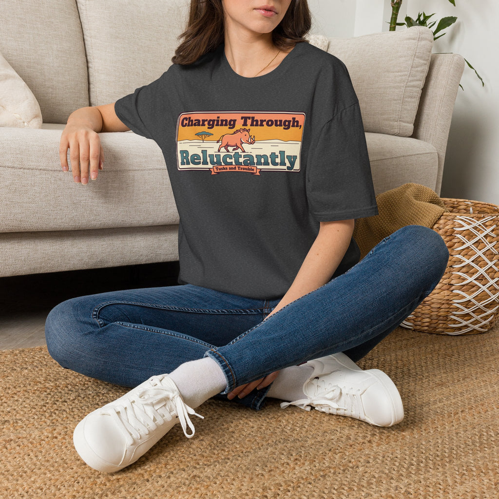 Dark heather T-shirt with charging-through and reluctantly graphic on the front