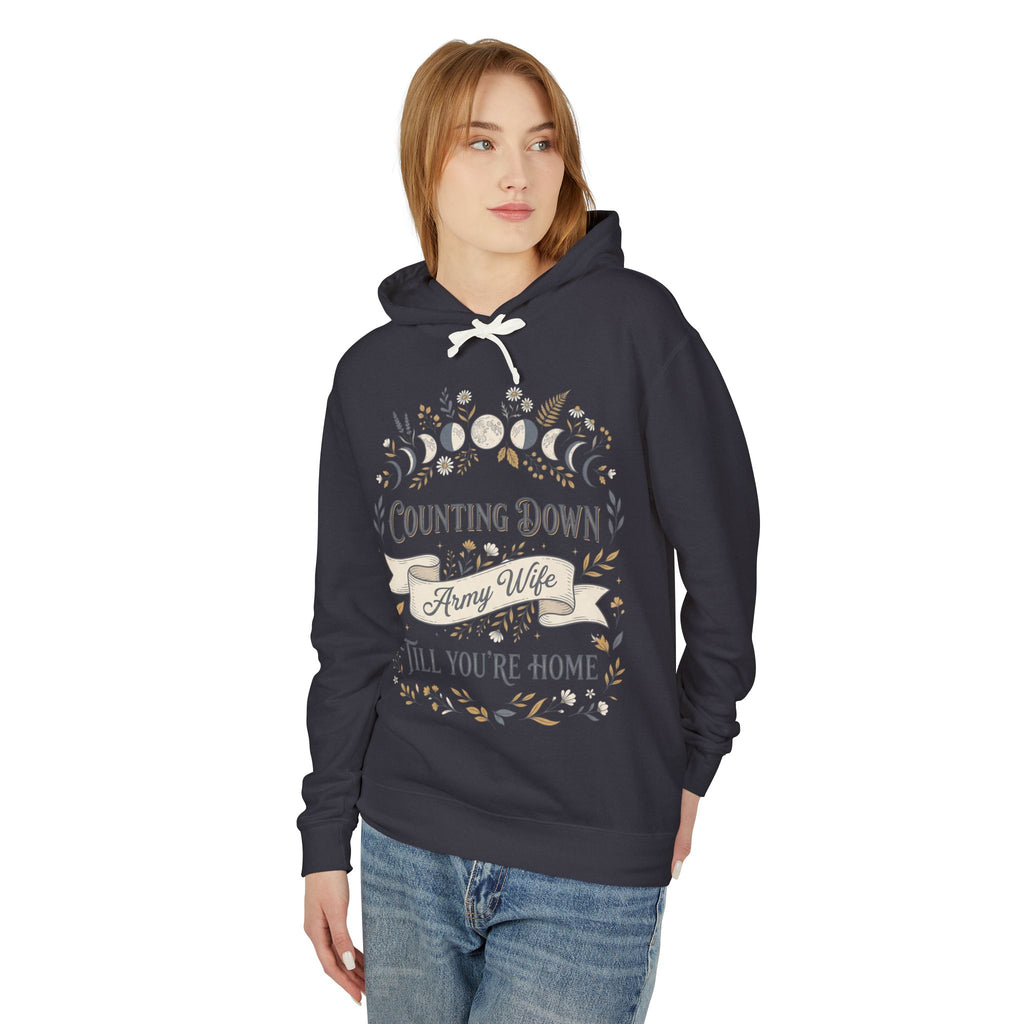 Black hoodie with front text graphic and white drawstring, long sleeves.