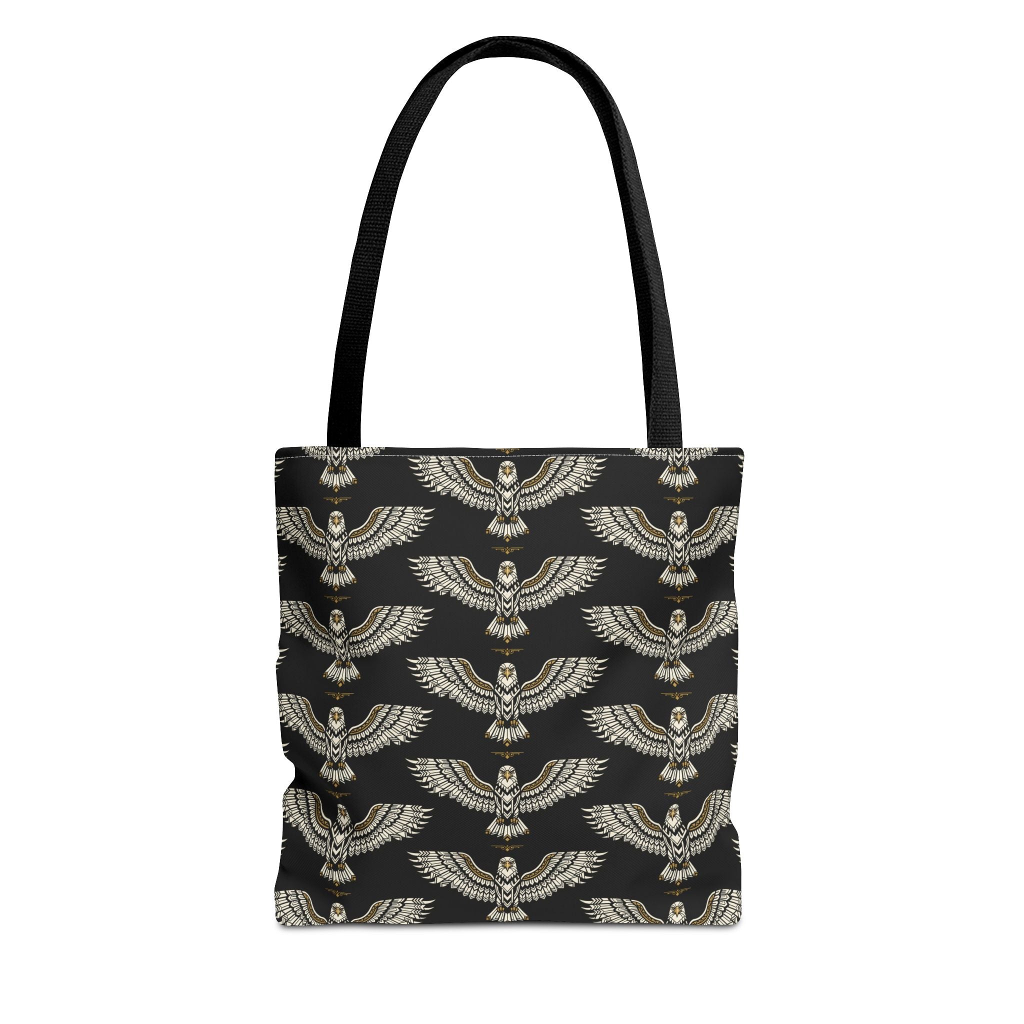 Tote bag with black fabric and repeating gold winged scarab pattern, black handles