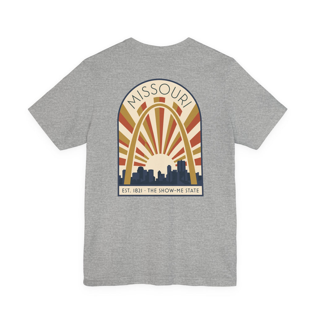 Heather grey Missouri sunrise art deco T-shirt with arch skyline graphic and “MISSOURI” text.