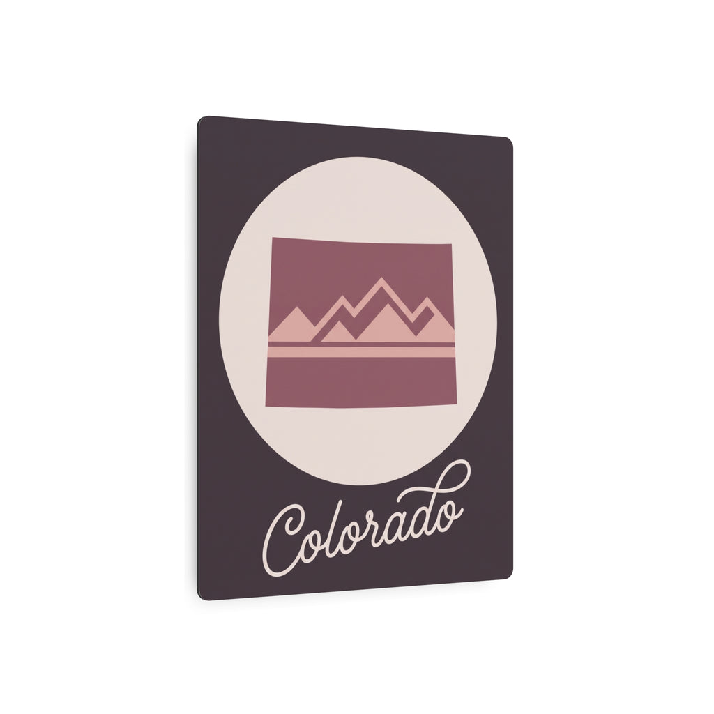 Mauve Colorado mountain metal wall art with cream circle and script "Colorado"