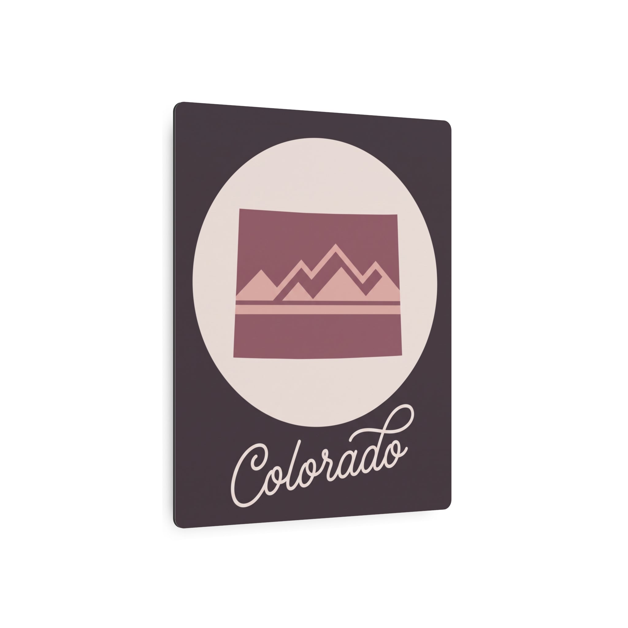 Mauve Colorado mountain metal wall art with cream circle and script "Colorado"