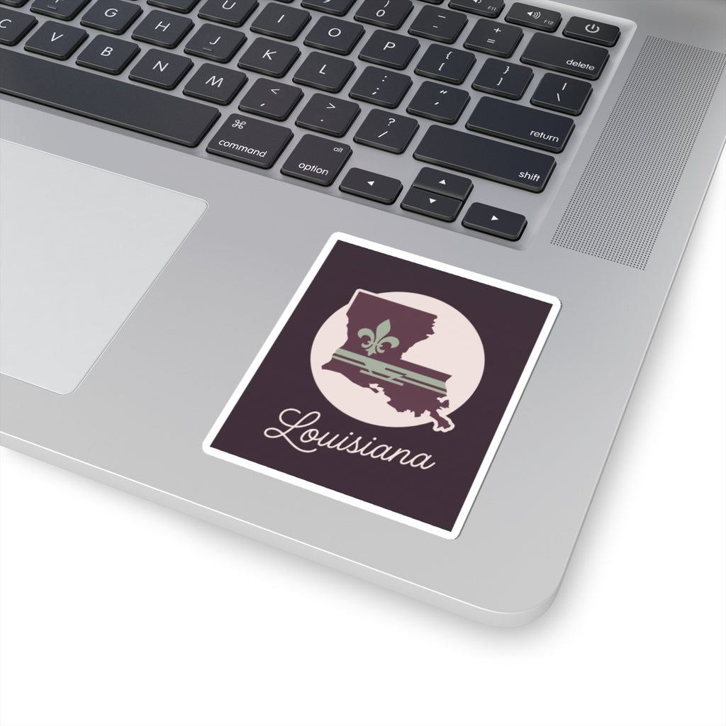 Louisiana silhouette vinyl sticker on laptop lid, mauve design with white circle