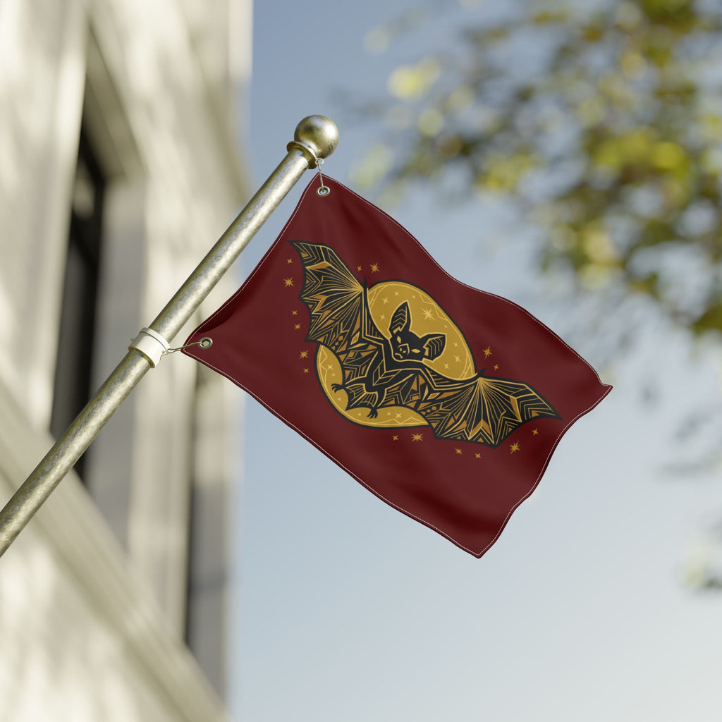 Burgundy bat moon flag on pole with finial, gold bat and moon graphic