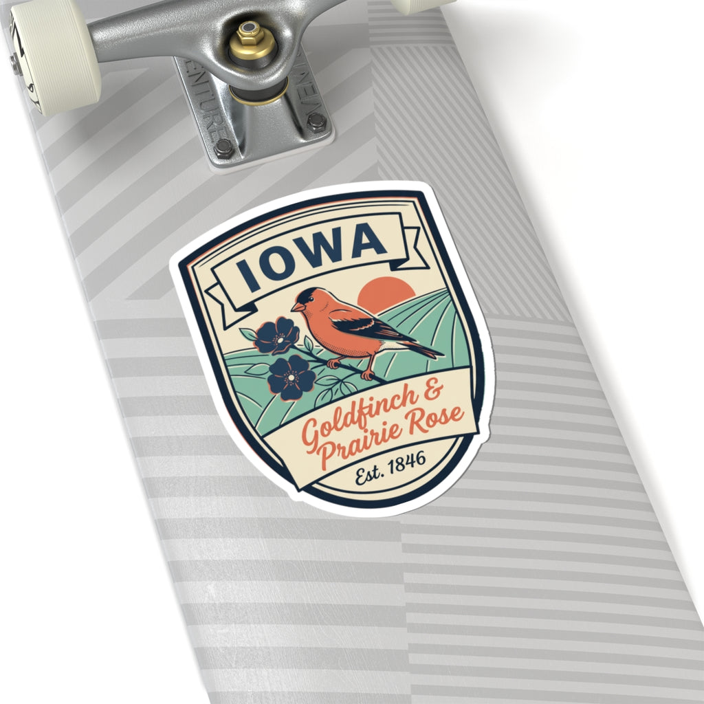 Iowa vintage badge sticker on light gray surface with goldfinch & prairie rose
