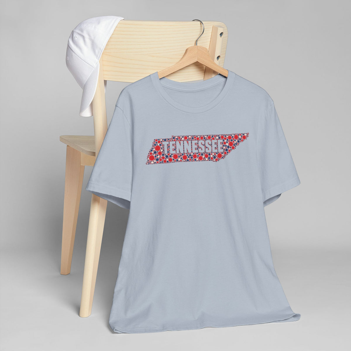 Light blue crewneck T-shirt with colorful Tennessee outline floral graphic