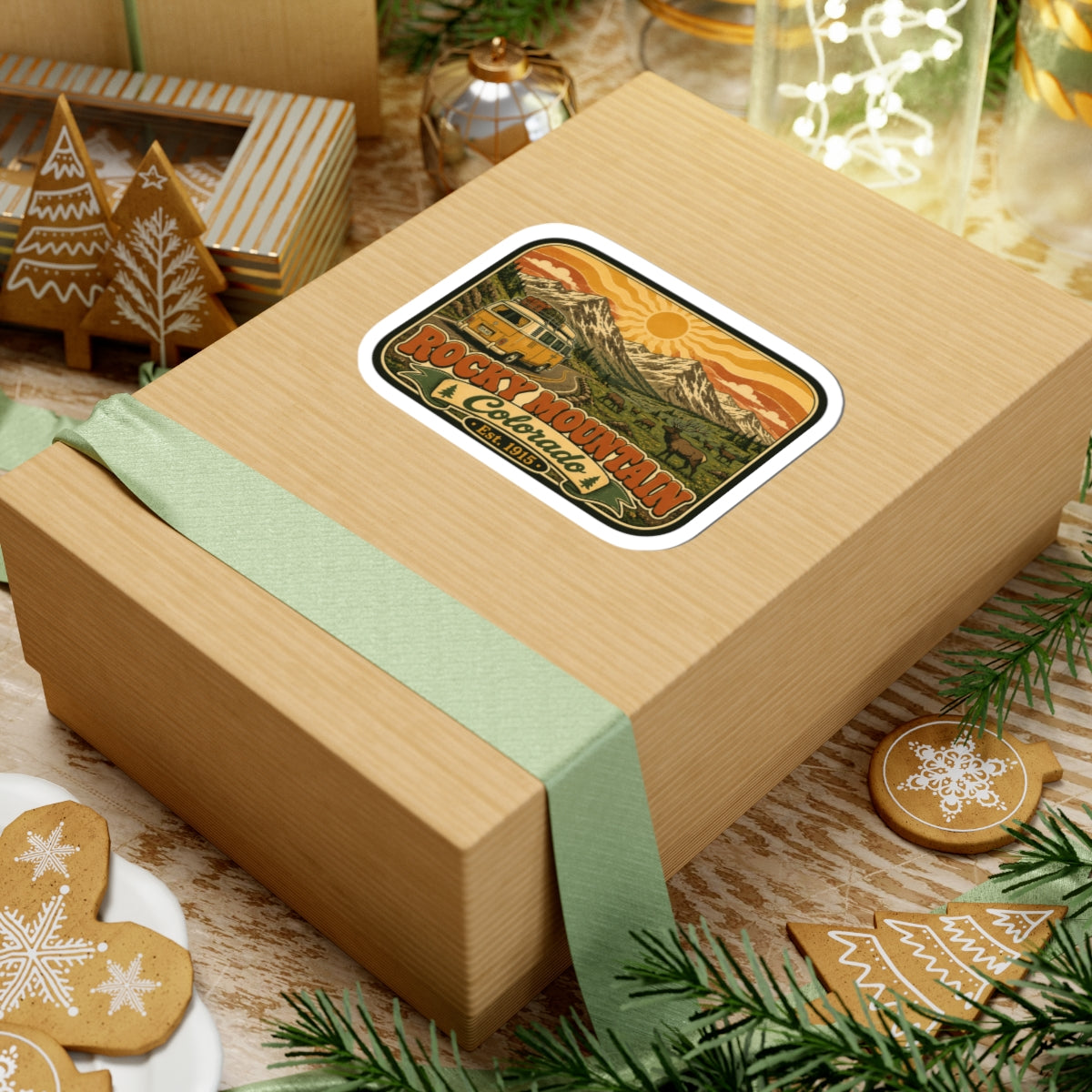 Vintage Rocky Mountain Colorado sticker on a wrapped gift, rounded white edge.