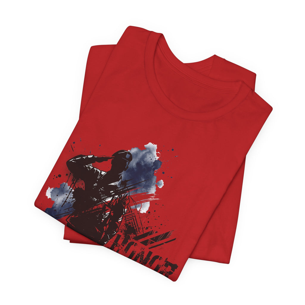 Red crewneck T-shirt with soldier silhouette graphic on front.