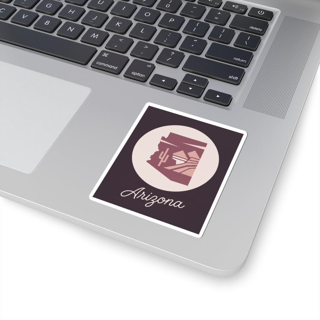 Mauve Arizona state silhouette vinyl sticker on white backing with cursive 'Arizona'