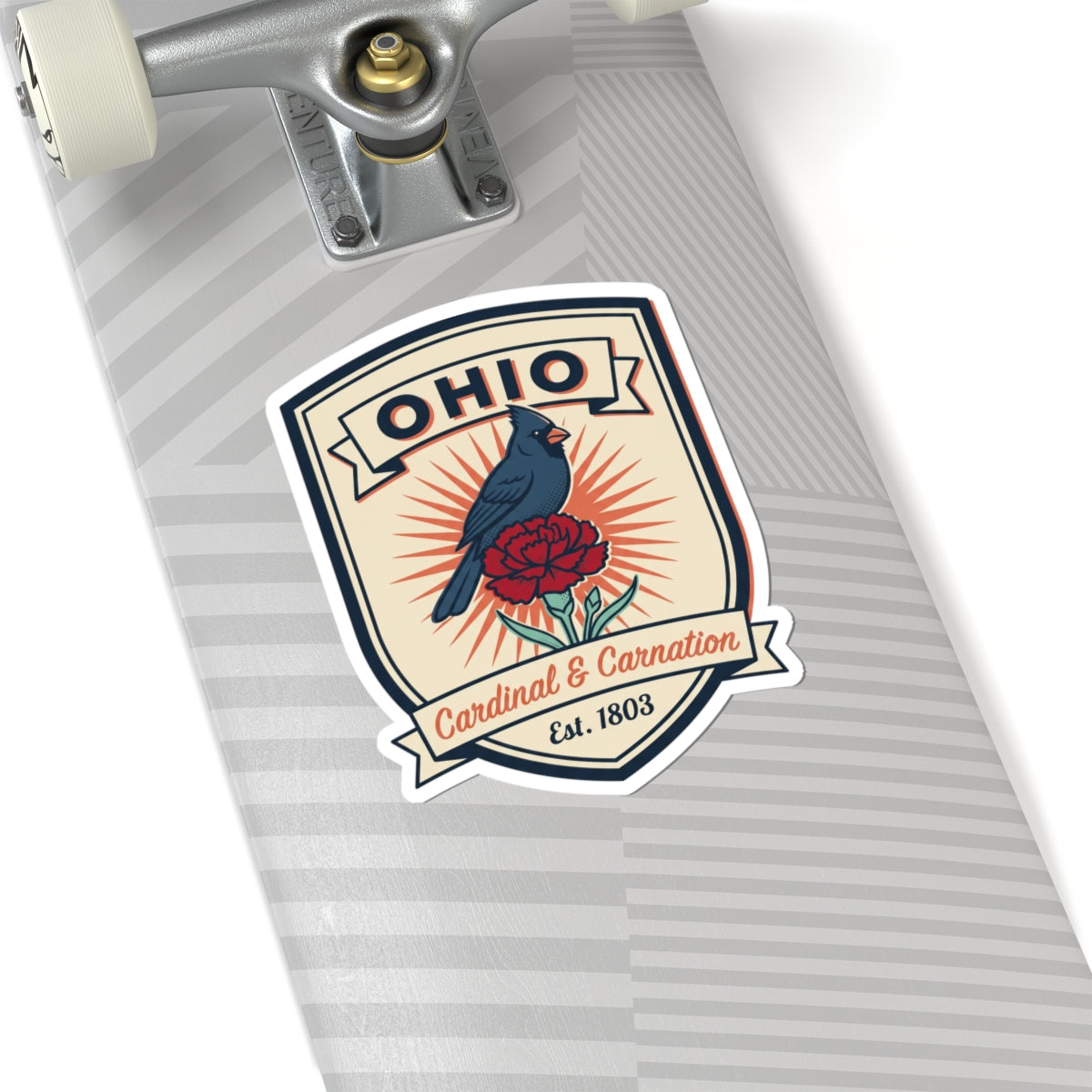 Ohio badge sticker on striped surface: blue cardinal and red carnation, Est. 1803
