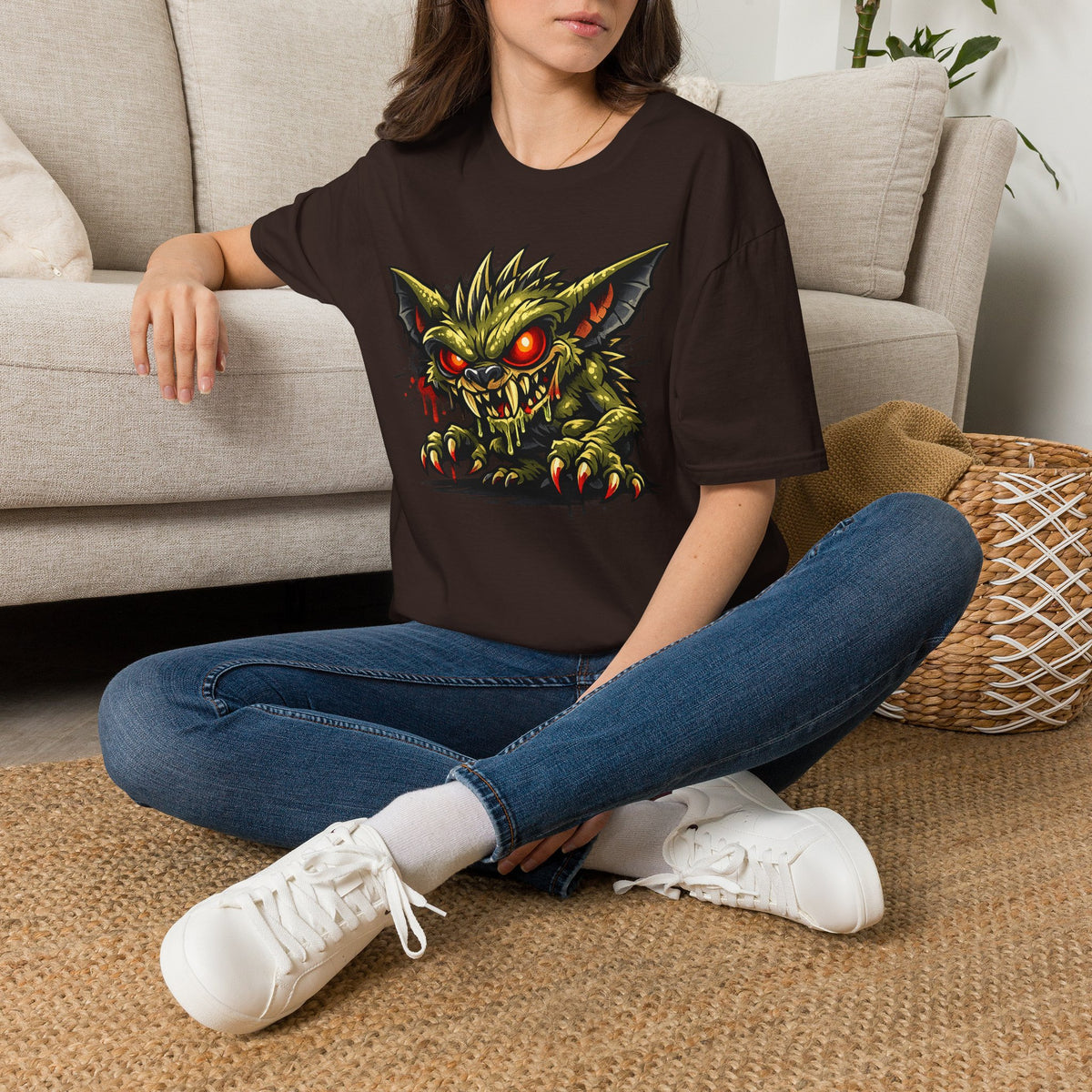Unisex dark crewneck T-shirt with green, red-eyed gremlin graphic front