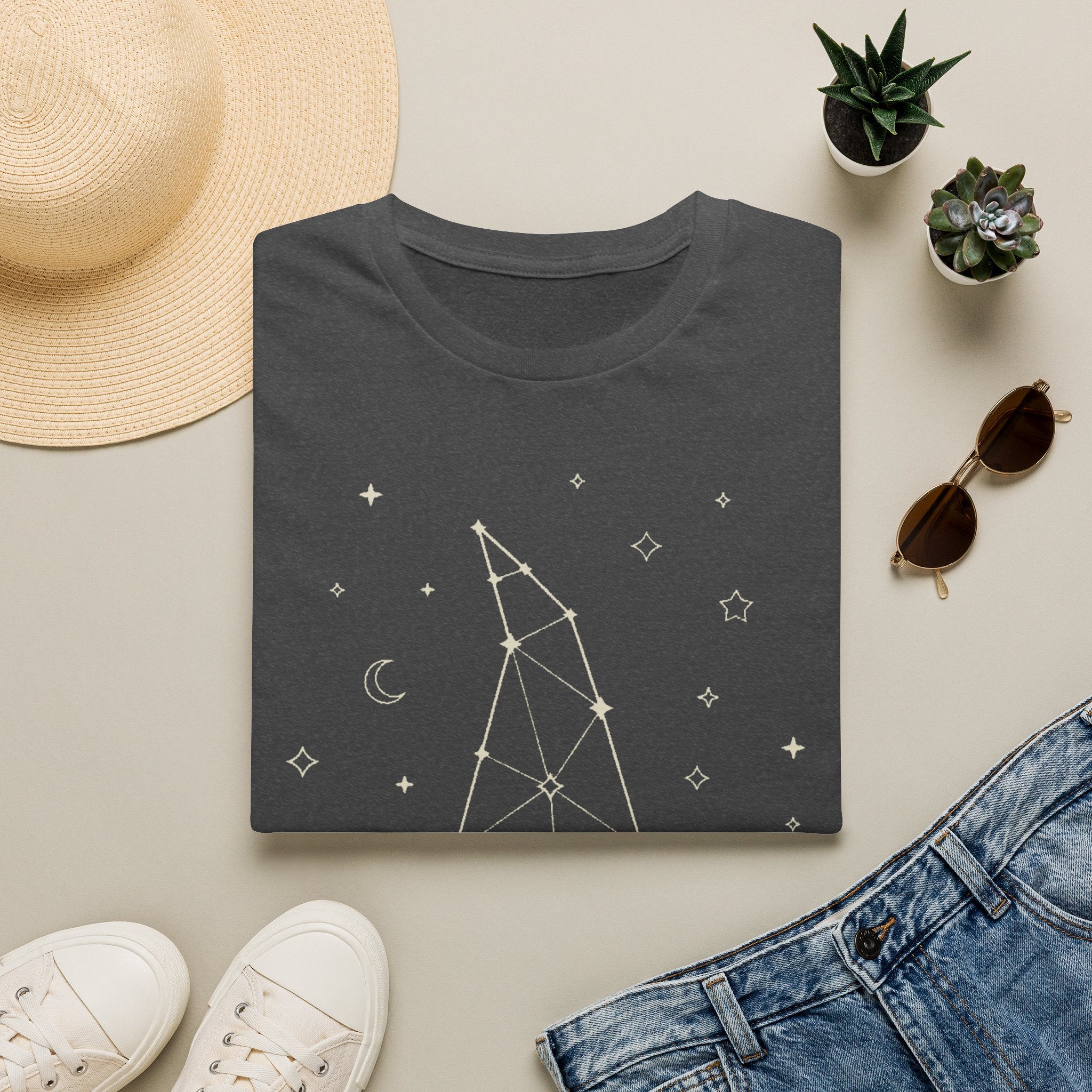 Charcoal gray witch constellation graphic T-shirt with star and moon symbols