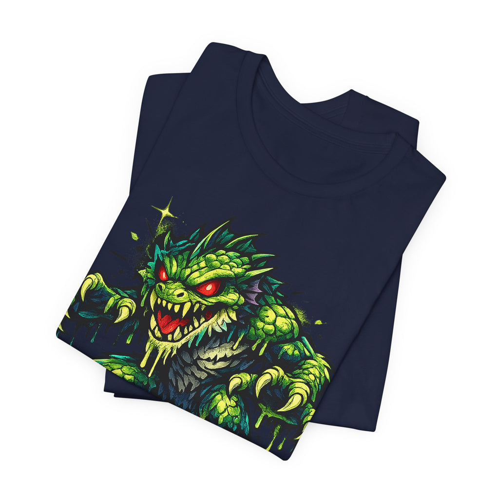 Navy graphic T-shirt with green monster illustration and red eyes on front