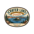 Round Crater Lake Oregon sticker with “Deepest Blue” ribbon and pine-and-lake illustration.