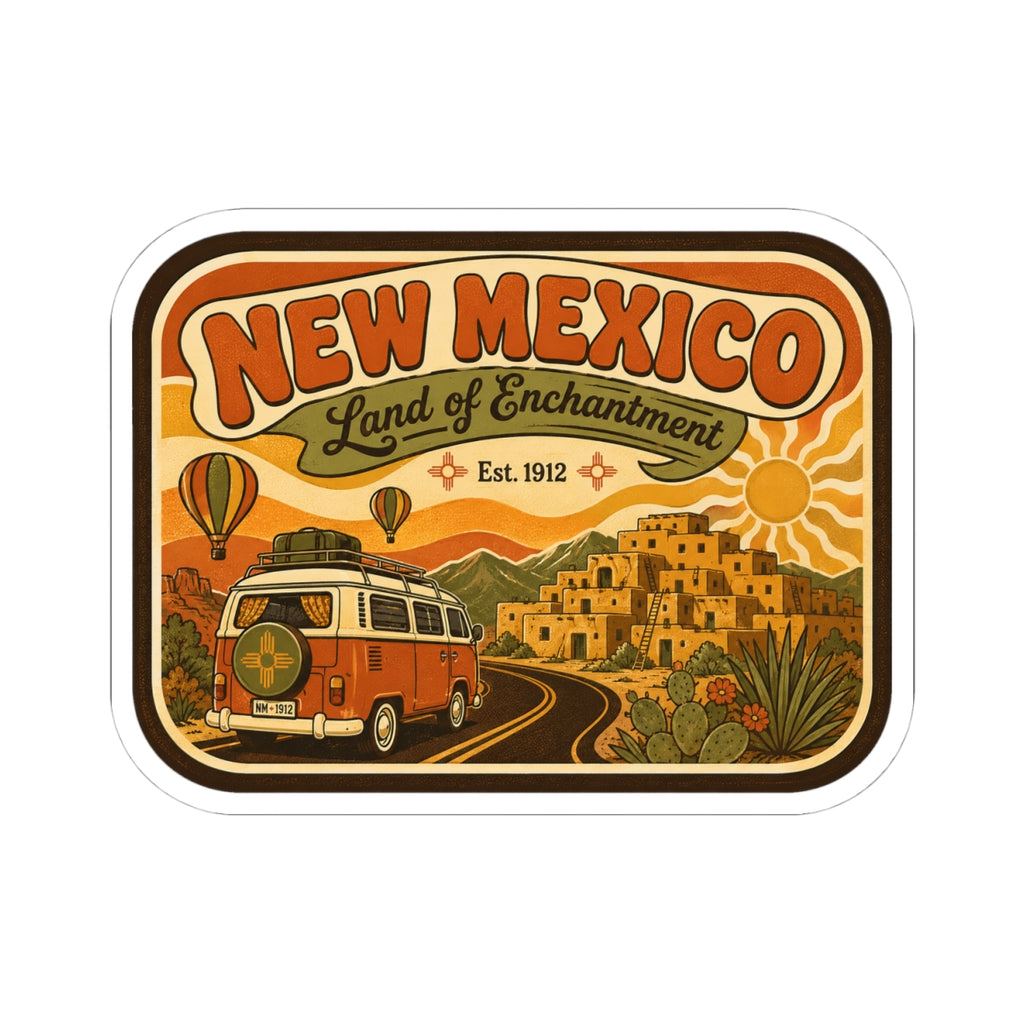 Die-cut New Mexico sticker featuring orange camper, desert scene, sun, and “Land of Enchantment”