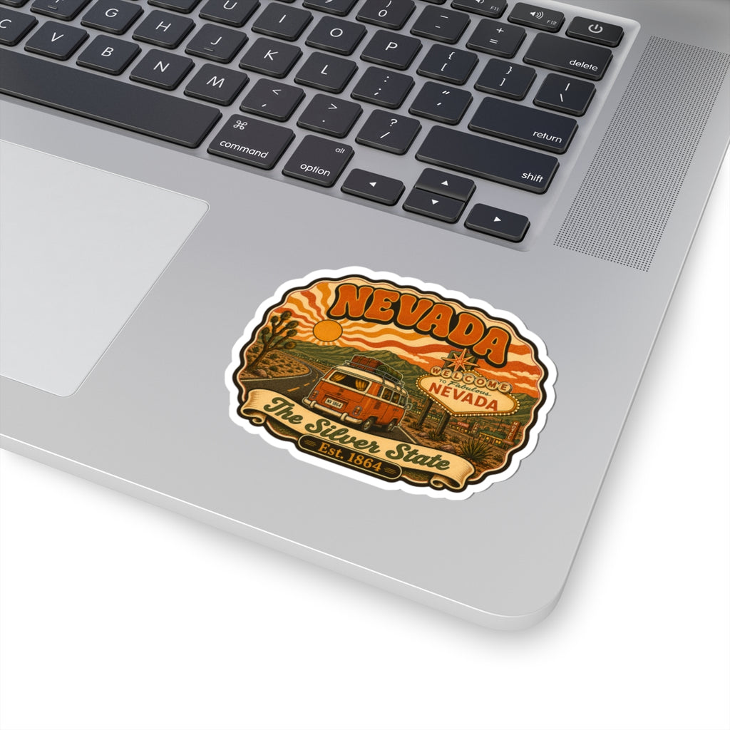 Nevada sticker on laptop lid: retro van graphic with "The Silver State" and Est. 1864