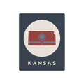 Kansas metal wall sign with circular flag graphic, tree icon, and KANSAS text