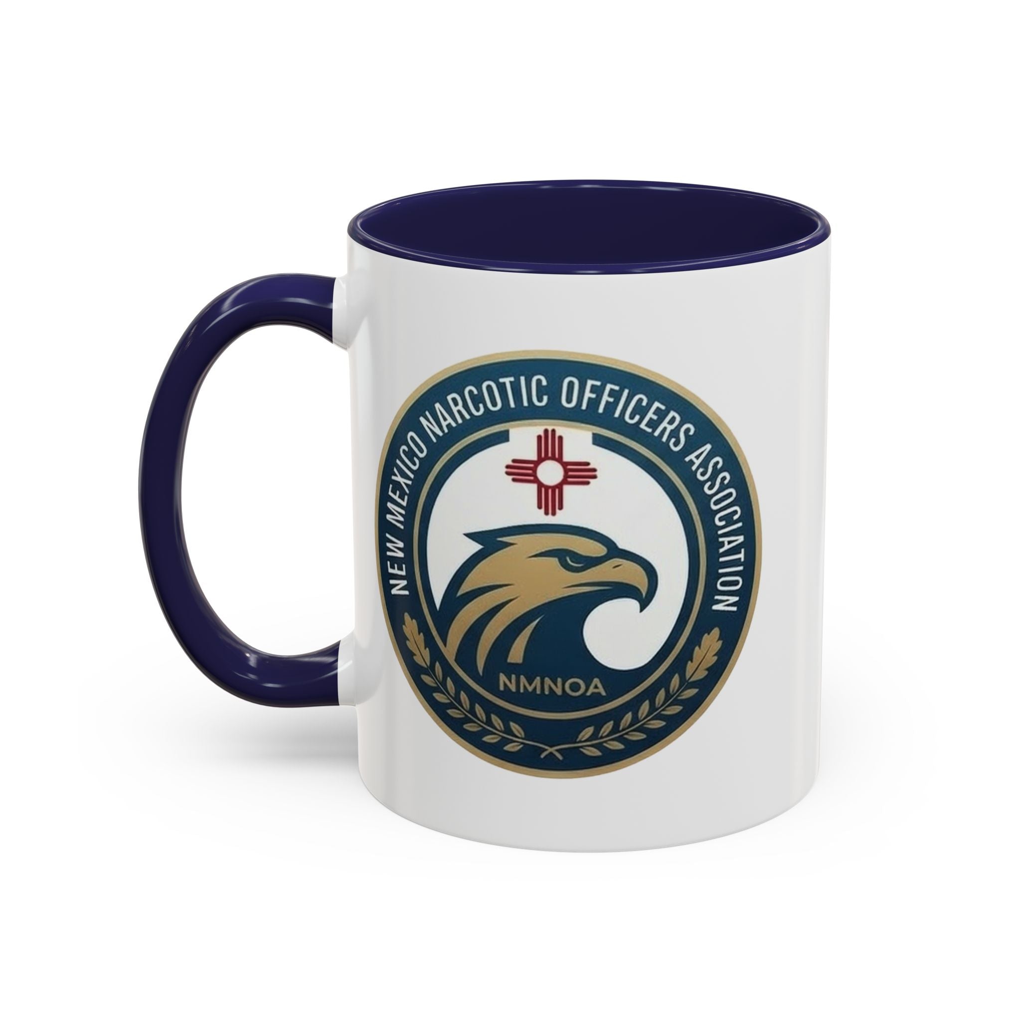White coffee mug with navy handle and rim, featuring NMNOA circular logo on front.
