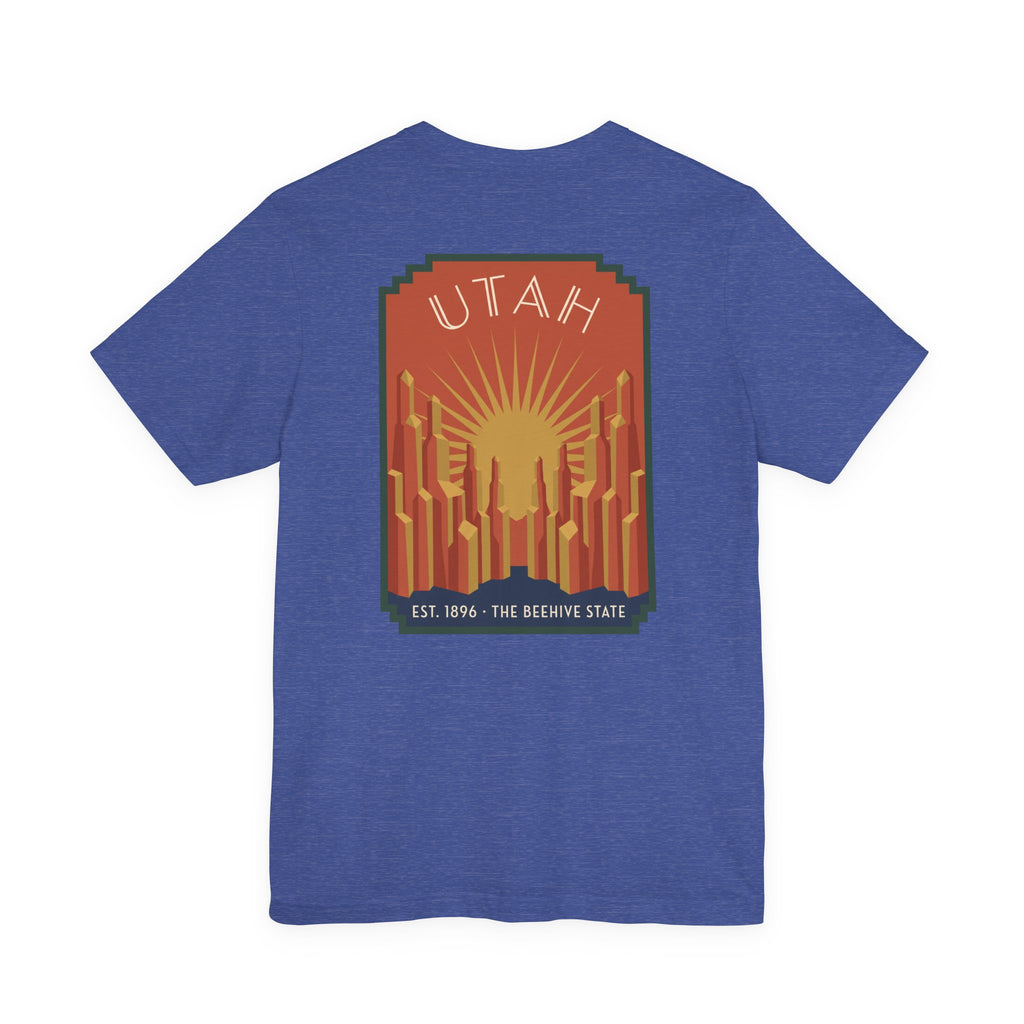 True royal blue T-shirt with Utah sunrise art deco square graphic, UTAH text and skyline