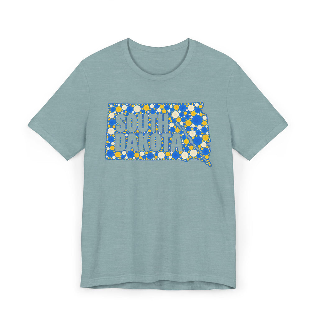 Light blue crewneck T-shirt with blue and yellow South Dakota polka-dot map graphic.