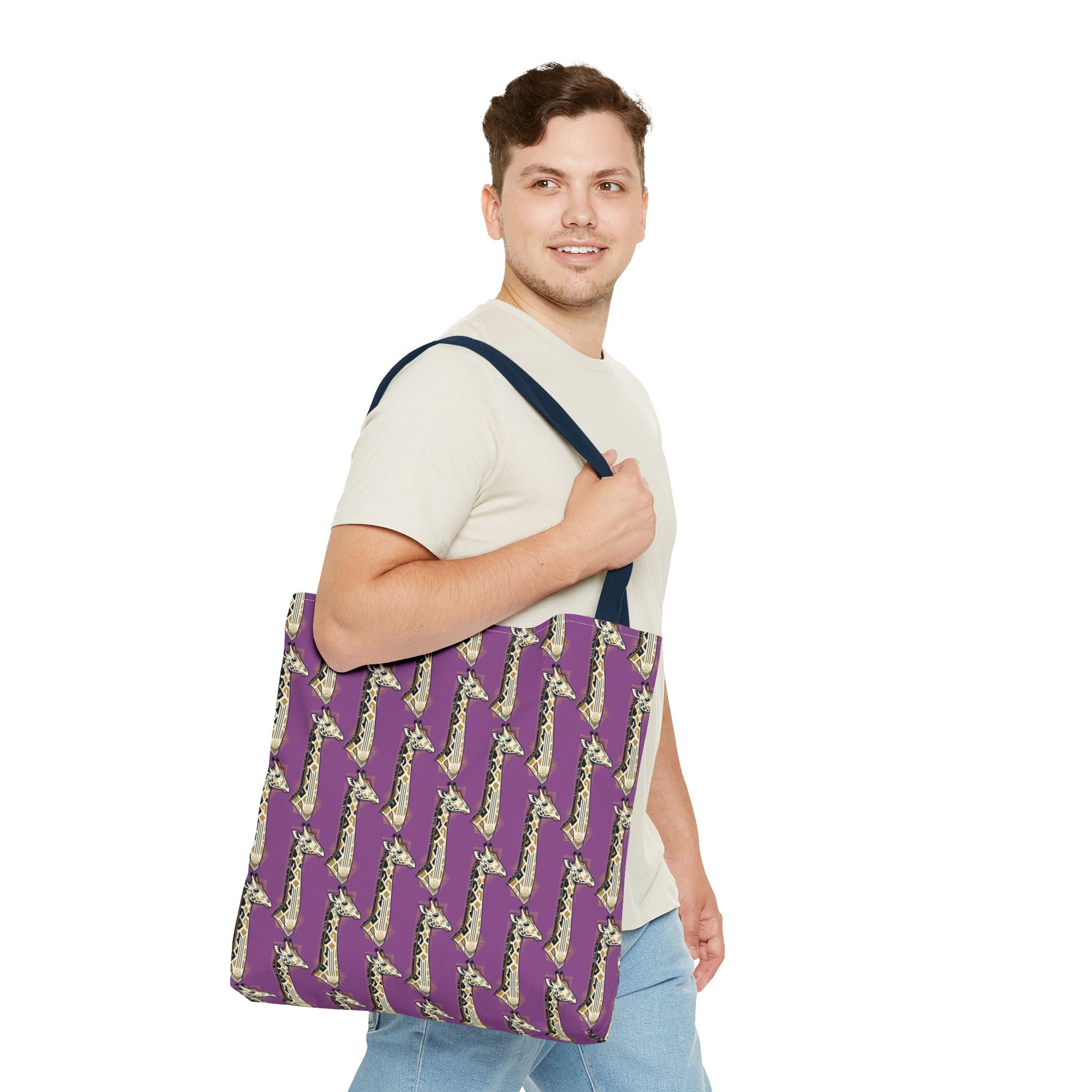 Purple tote bag with saxophone pattern and navy handles, worn across shoulder.