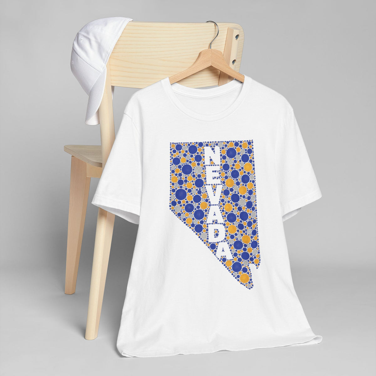 White crew-neck T-shirt with blue-and-gold Nevada map graphic