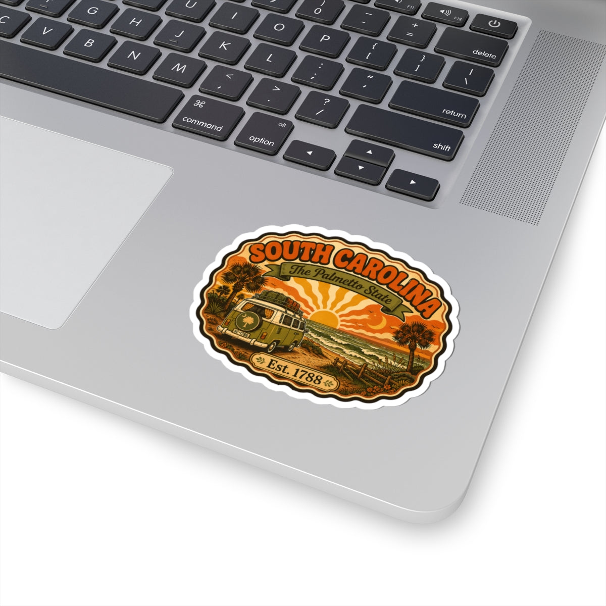 South Carolina vintage camper sticker on a laptop lid; The Palmetto State and Est. 1788.