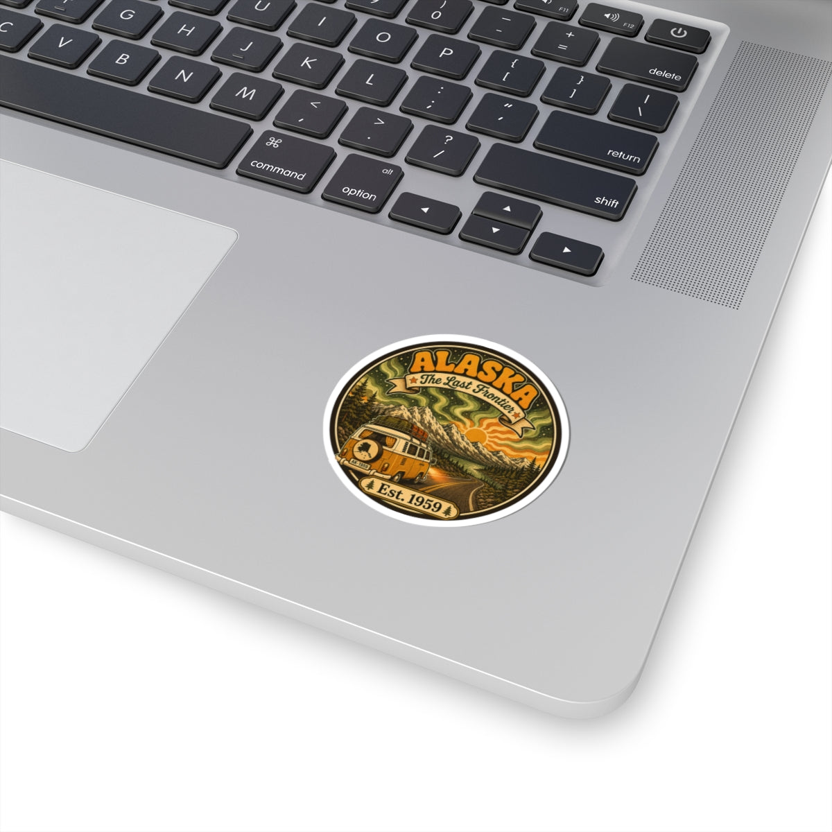 Circular vintage camper van sticker with ALASKA text and Est. 1959, gold border
