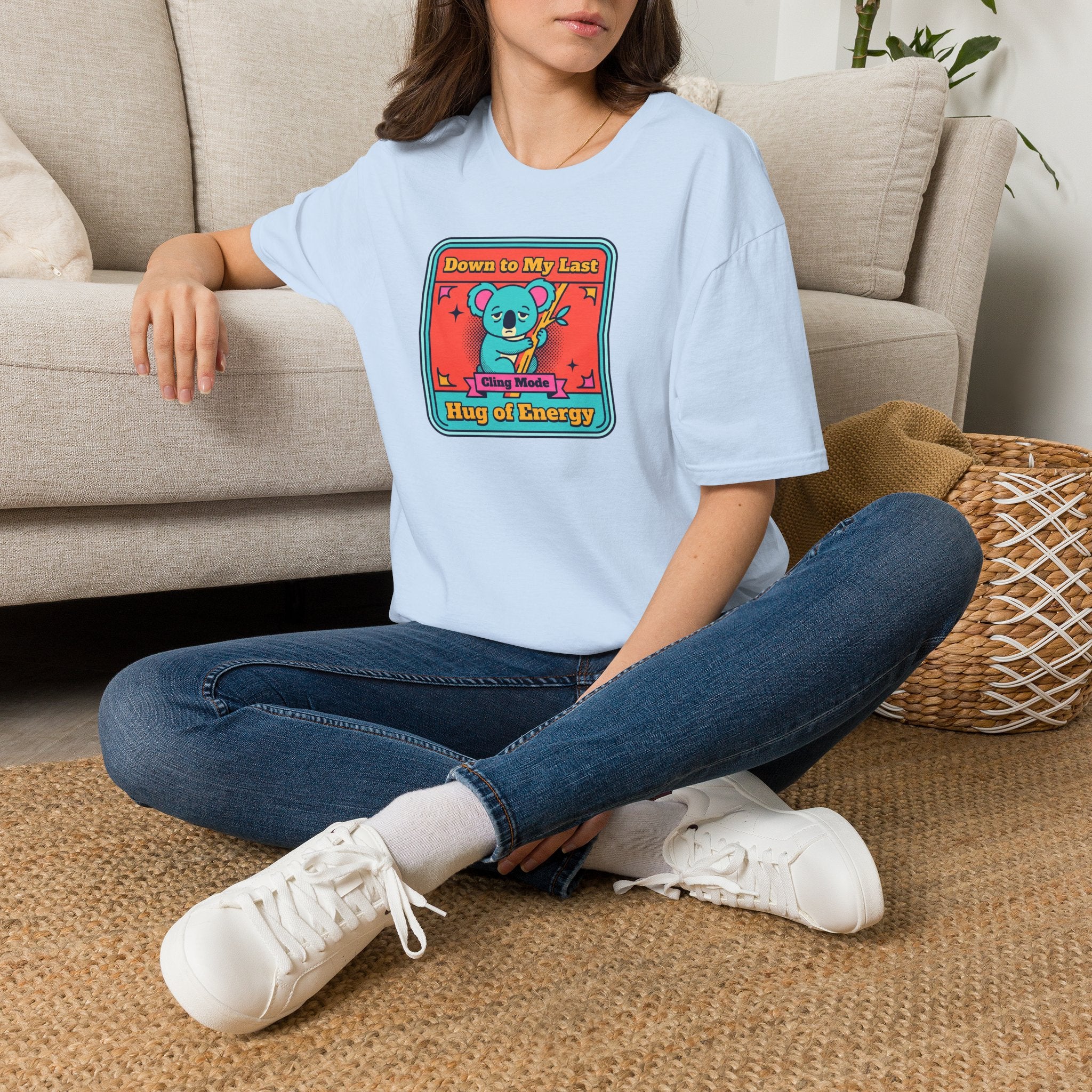 Light blue short-sleeve t-shirt with framed koala graphic at chest.